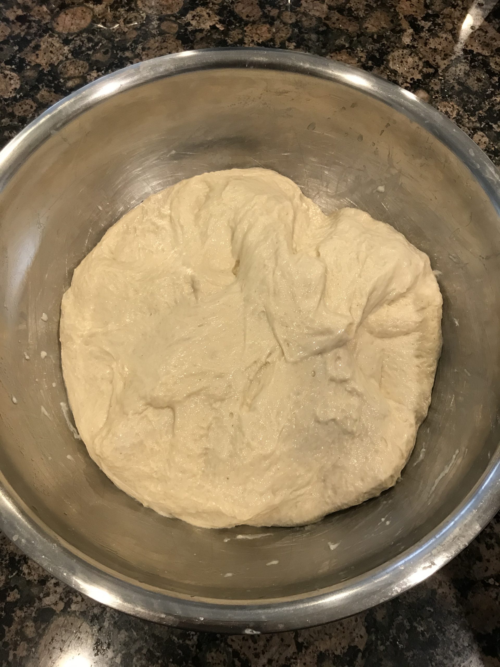 Initially, the dough is very sticky and wet
