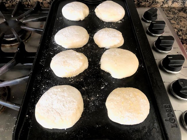 soft sourdough english-muffins-on-cast-iron